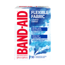 A packet of BAND-AID® Flexible Fabric Bandages with Watercolour Design, 30 assorted sizes, and 3 bandages showcased next to the packet