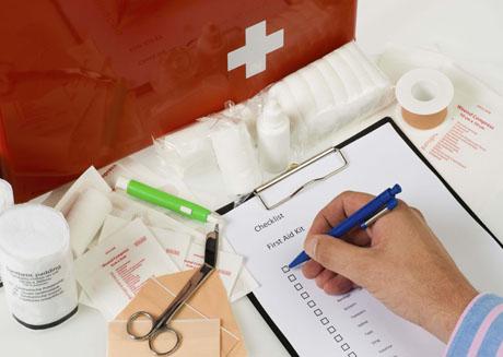 Ticking a first-aid kit check list